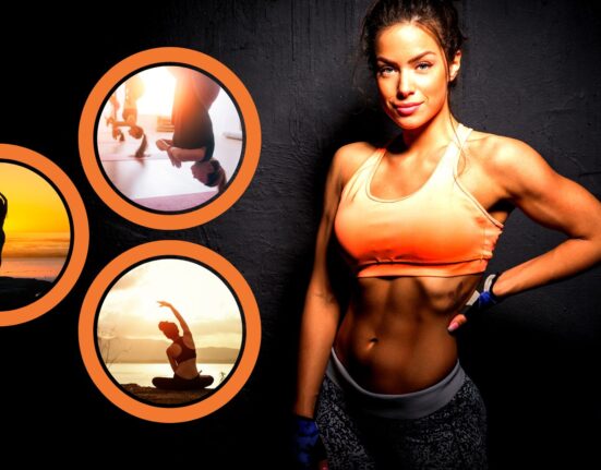 Beautiful woman with ripped body six pack abs showing off her fitness.